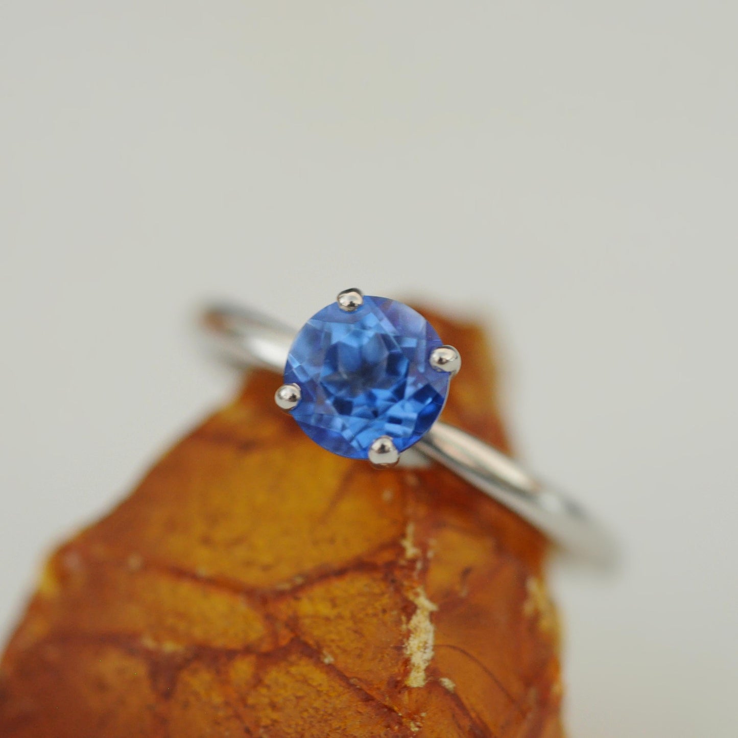 Makynna - Bright and Beautiful Blue Topaz Solitaire Ring Set in Solid Sterling Silver, Rhodium Plated for Ease of Care. Free Shipping in US.