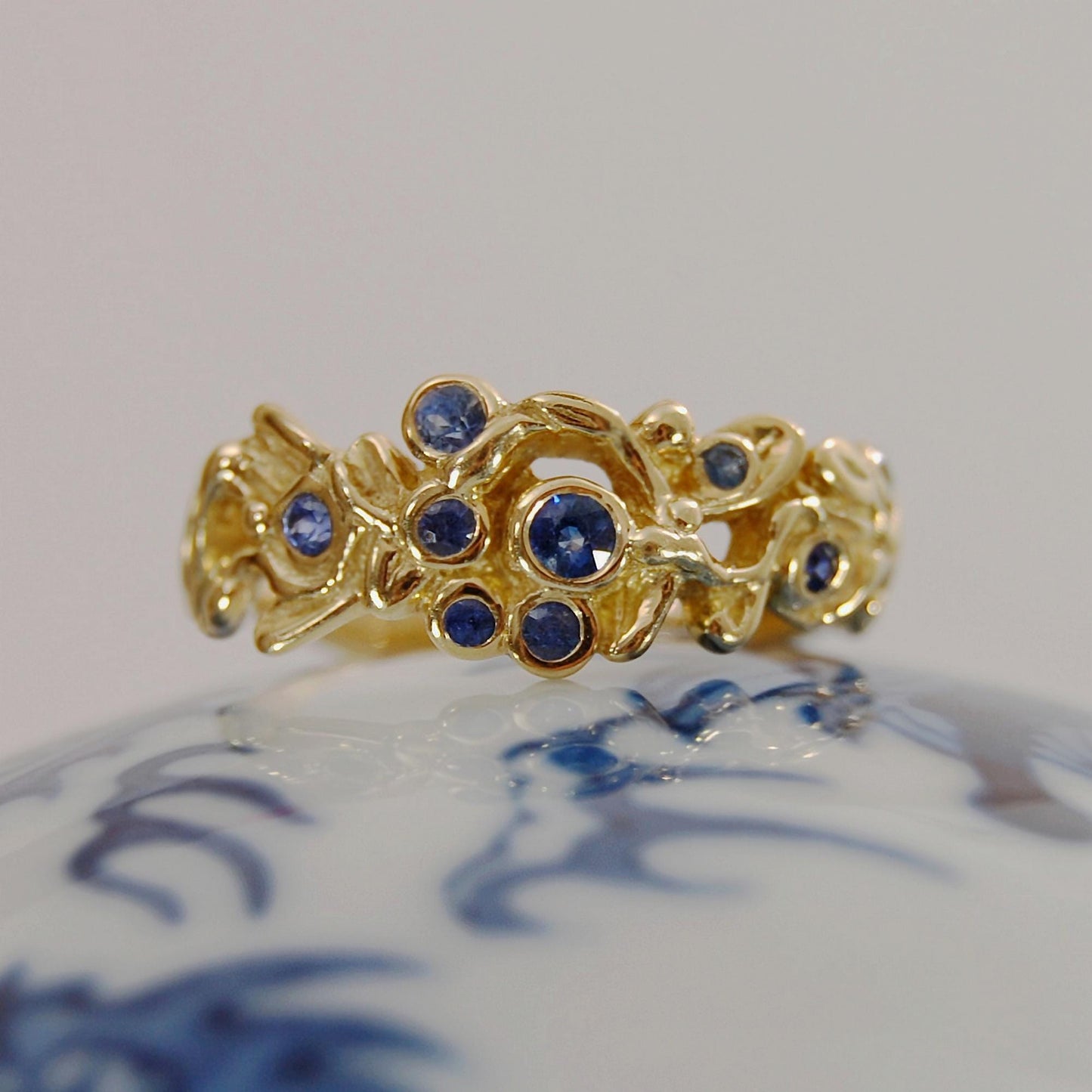 Alyssa - Blue Sapphire Ring Set in 14kt Solid Gold with a Floral Motif. SHOP EXCLUSIVE. Free Shipping US.