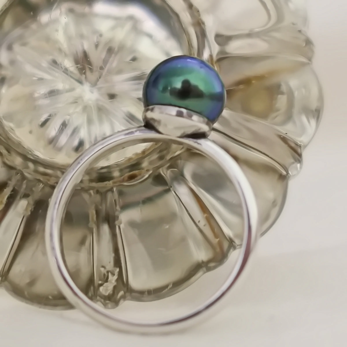 Inger- Pearl Solitaire Ring Features a Blue Green Akoya Pearl Set in Solid Sterling Silver.