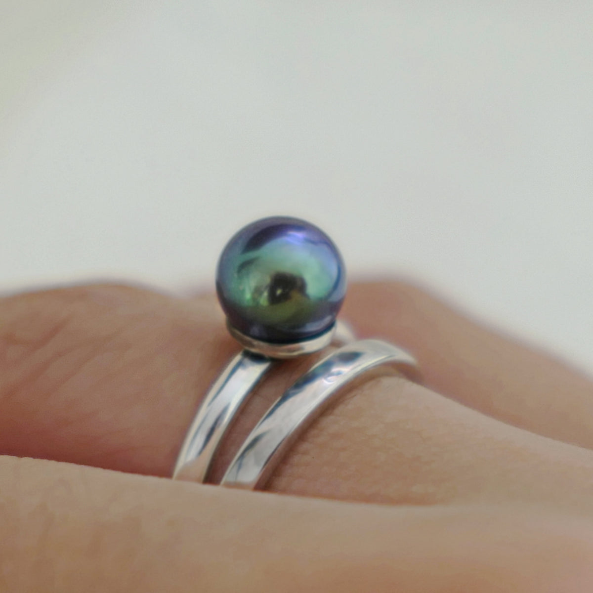 Inger- Pearl Solitaire Ring Features a Blue Green Akoya Pearl Set in Solid Sterling Silver.