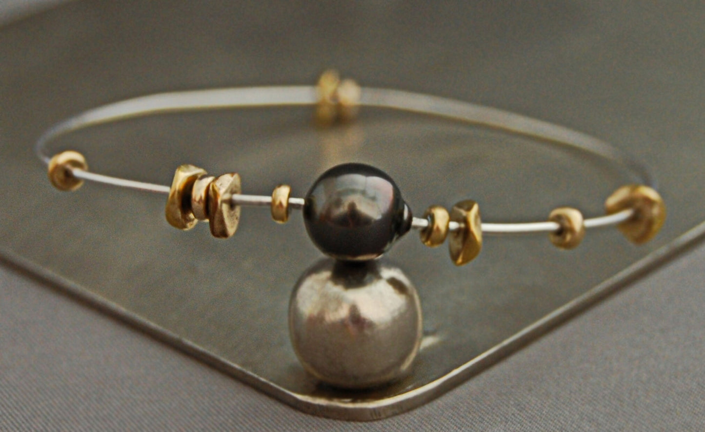 Lilith - Sterling Silver & Tahitian Pearl Bangle Bracelet with African Brass Beads. Free Shipping US.