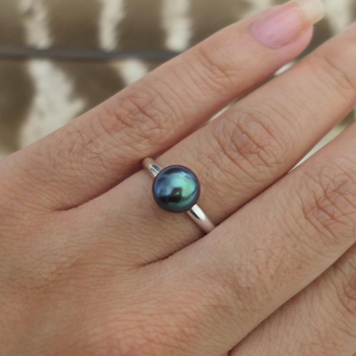 Inger- Pearl Solitaire Ring Features a Blue Green Akoya Pearl Set in Solid Sterling Silver.