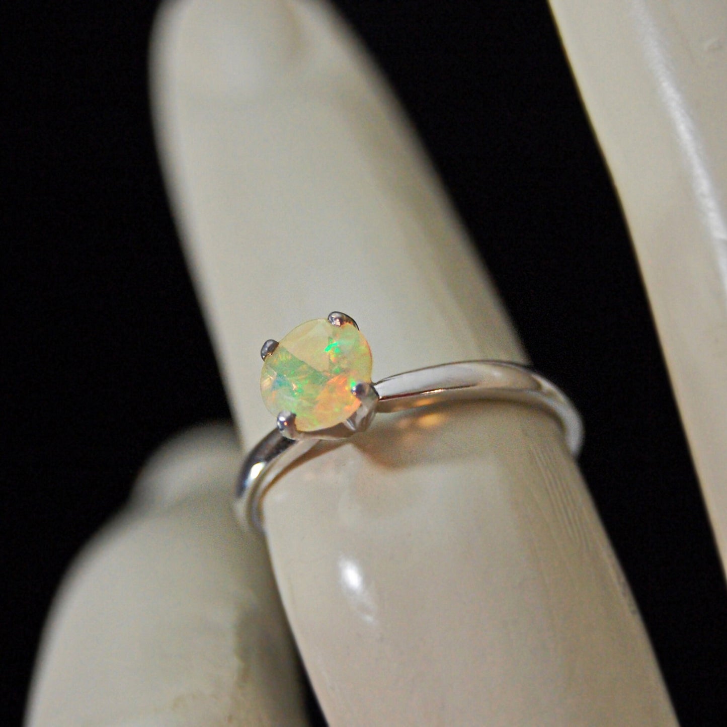 Callie - Solitaire Ring Features a Brilliant Opal Set in Solid Rhodium Plated Sterling Silver for Ease of Care. FREE SHIP US.