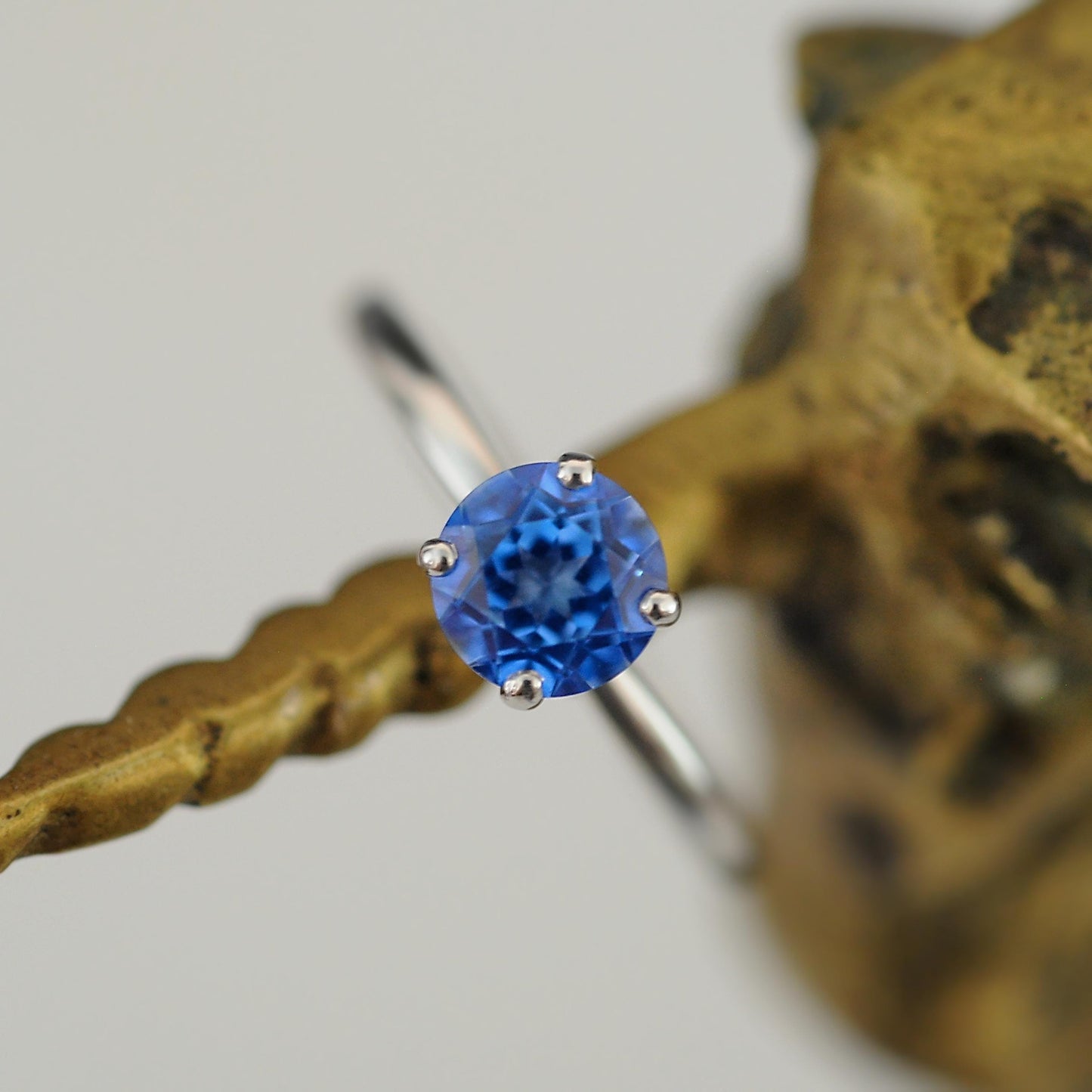 Makynna - Bright and Beautiful Blue Topaz Solitaire Ring Set in Solid Sterling Silver, Rhodium Plated for Ease of Care. Free Shipping in US.