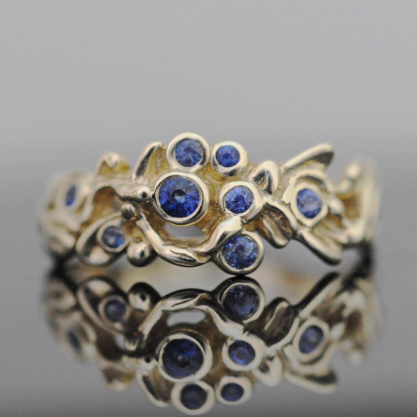 Alyssa - Blue Sapphire Ring Set in 14kt Solid Gold with a Floral Motif. SHOP EXCLUSIVE. Free Shipping US.