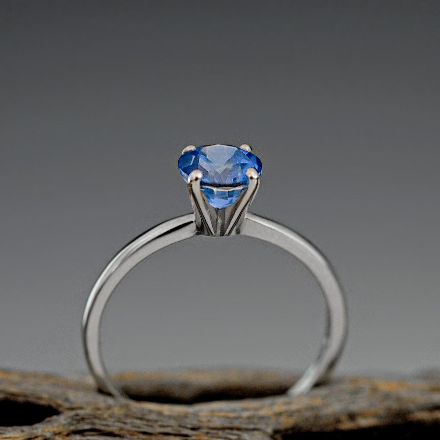 Makynna - Bright and Beautiful Blue Topaz Solitaire Ring Set in Solid Sterling Silver, Rhodium Plated for Ease of Care. Free Shipping in US.