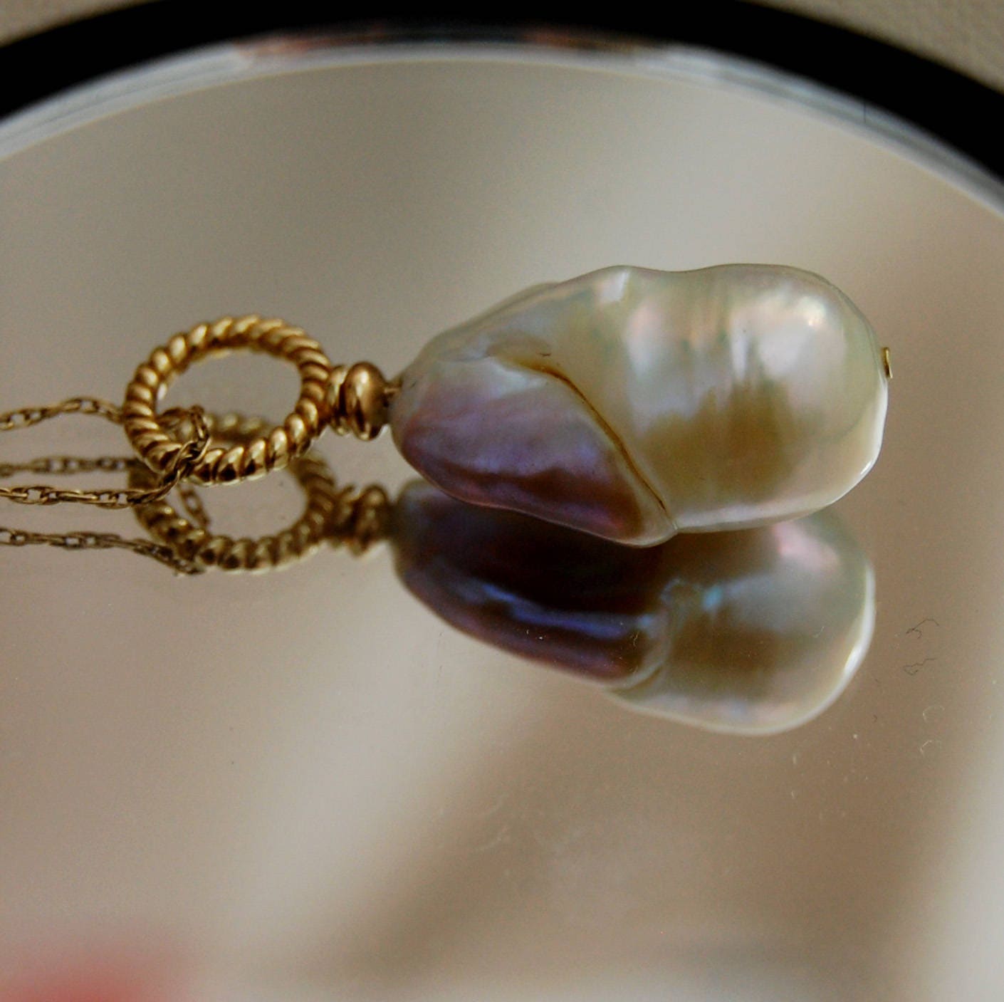 Lillia - Pearl Pendant Features a Unique Bi-Color Freshwater Pearl Set in 14kt Gold, Free Shipping within the US.