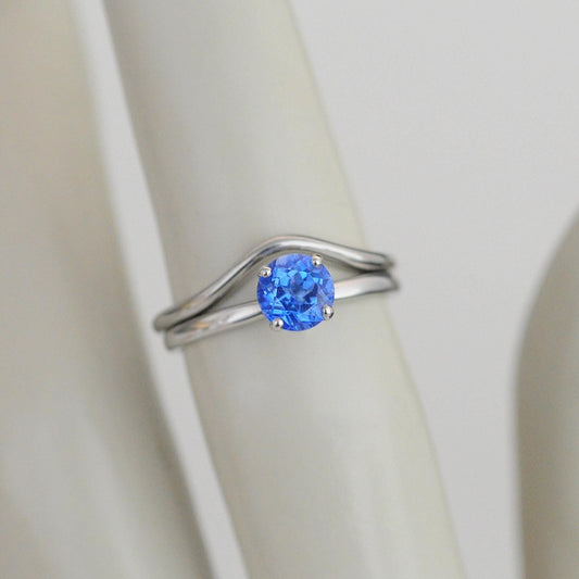 Makynna - Bright and Beautiful Blue Topaz Solitaire Ring Set in Solid Sterling Silver, Rhodium Plated for Ease of Care. Free Shipping in US.