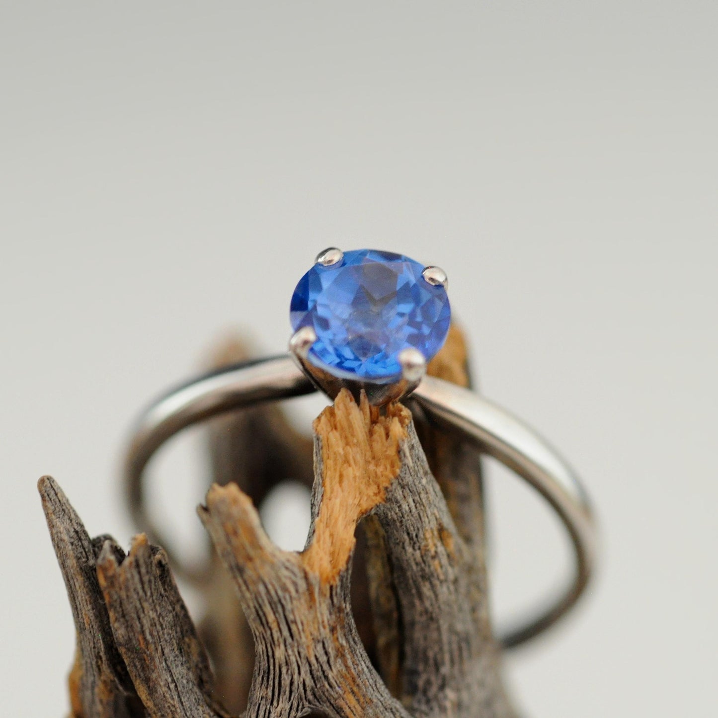 Makynna - Bright and Beautiful Blue Topaz Solitaire Ring Set in Solid Sterling Silver, Rhodium Plated for Ease of Care. Free Shipping in US.