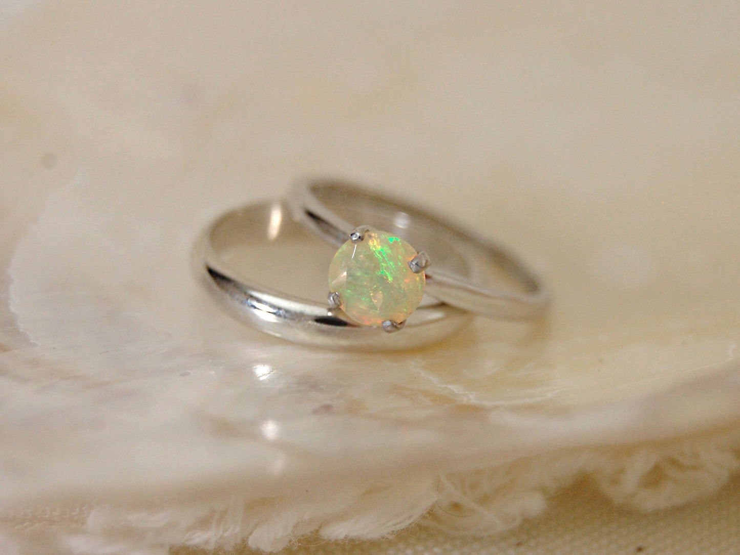 Callie - Solitaire Ring Features a Brilliant Opal Set in Solid Rhodium Plated Sterling Silver for Ease of Care. FREE SHIP US.