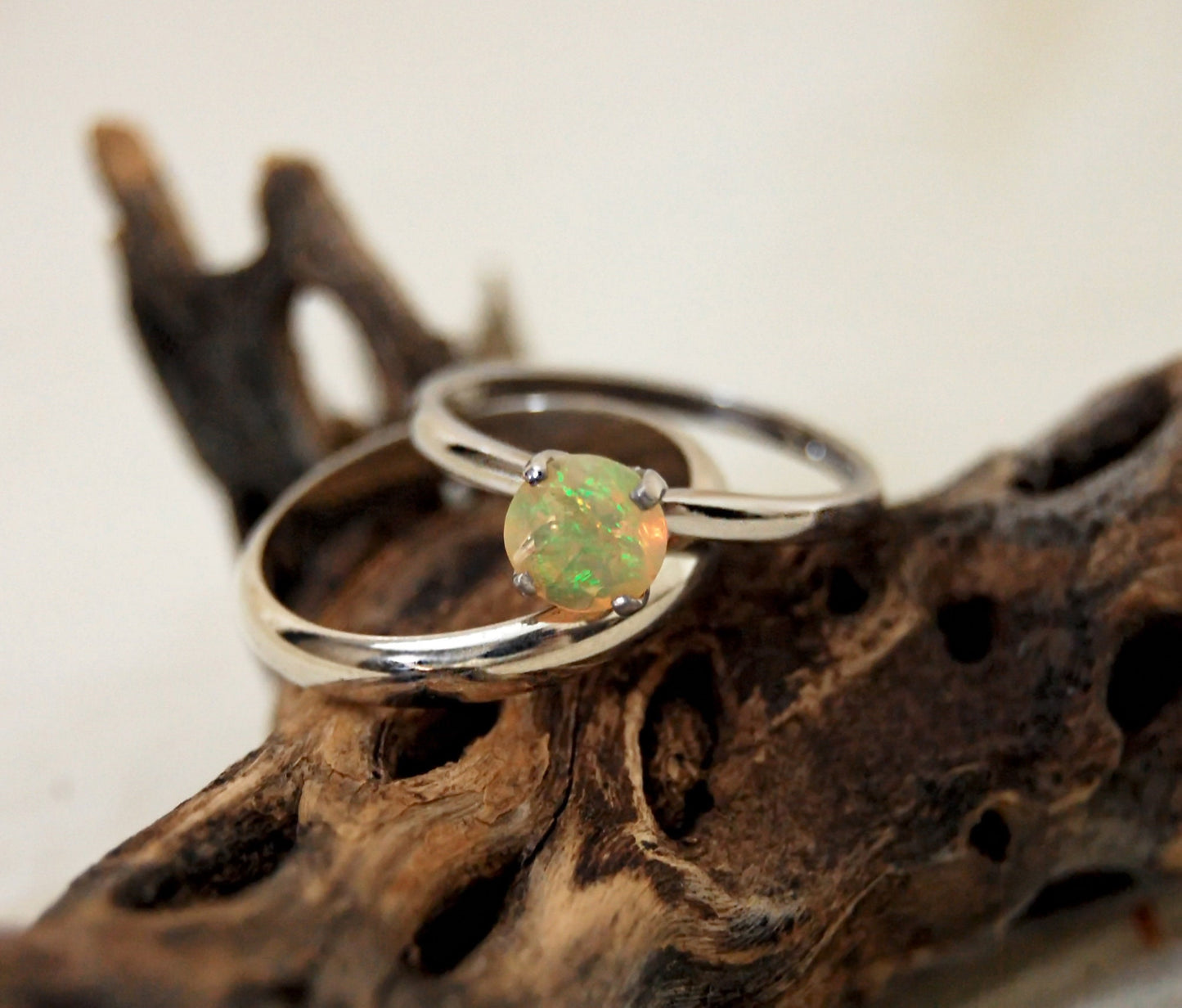 Callie - Solitaire Ring Features a Brilliant Opal Set in Solid Rhodium Plated Sterling Silver for Ease of Care. FREE SHIP US.