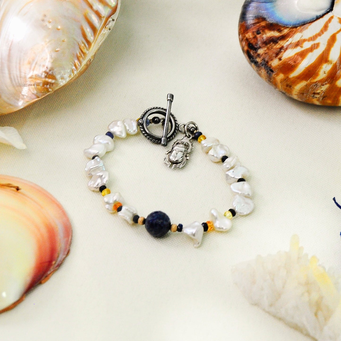 Terzah- Boho Keshi Pearl and Sapphire Bracelet with Detailed Scarab Beetle Charm.