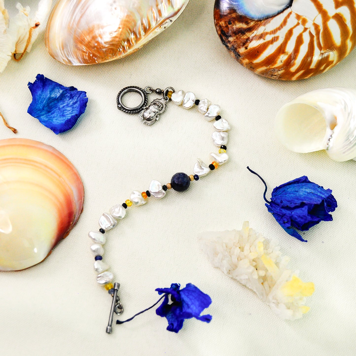 Terzah- Boho Keshi Pearl and Sapphire Bracelet with Detailed Scarab Beetle Charm.