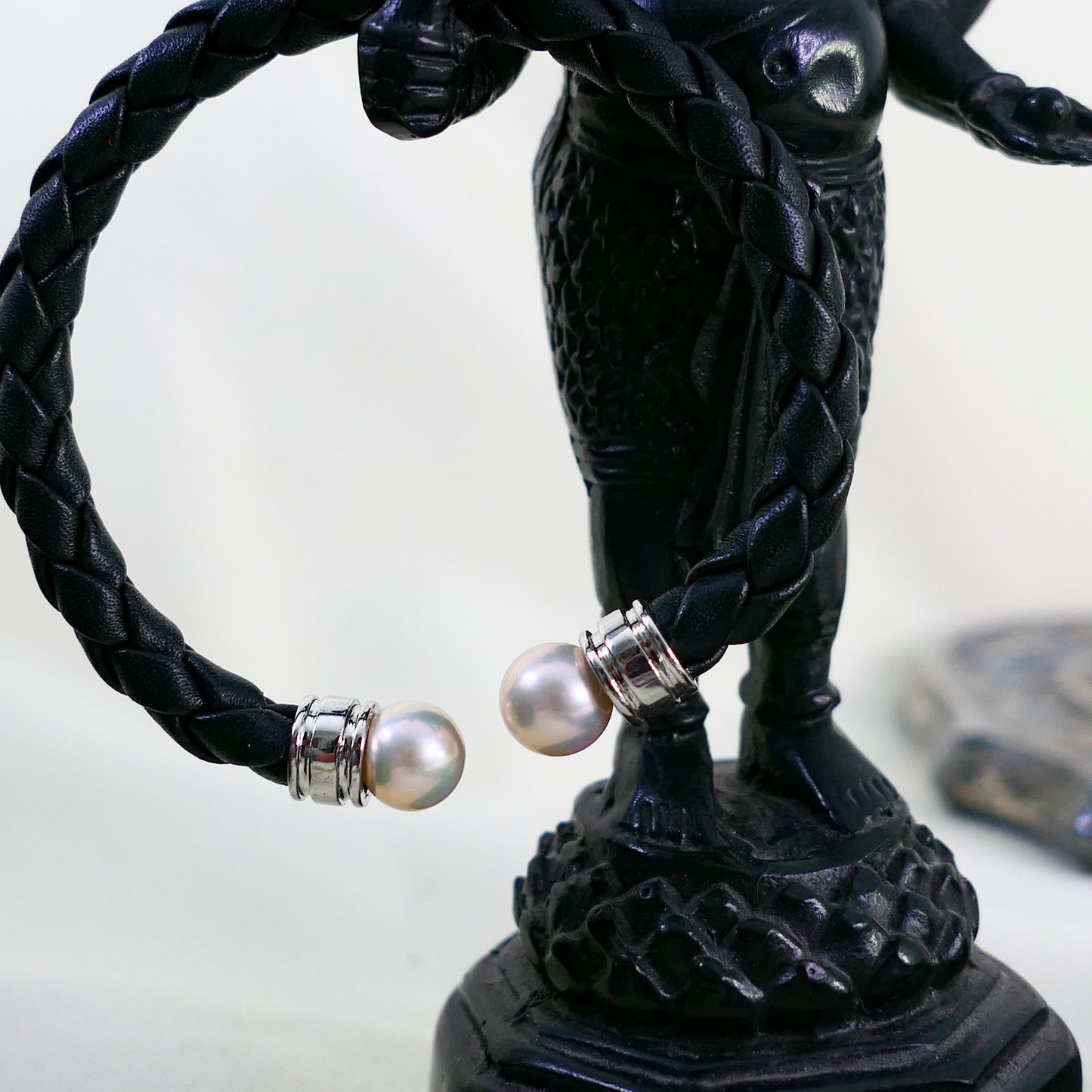 Ciara - Cuff Bracelet Features Perfectly Matched Pearls Set on a Flexible, Braided Leather and Sterling Silver Cuff.
