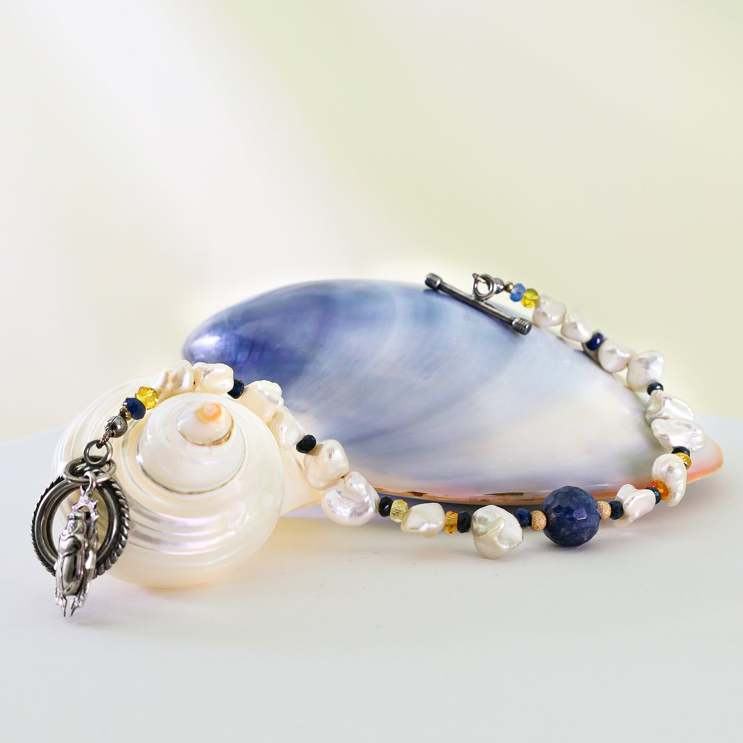 Terzah- Boho Keshi Pearl and Sapphire Bracelet with Detailed Scarab Beetle Charm.