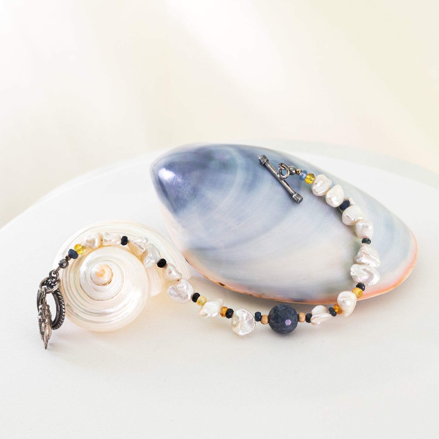 Terzah- Boho Keshi Pearl and Sapphire Bracelet with Detailed Scarab Beetle Charm.