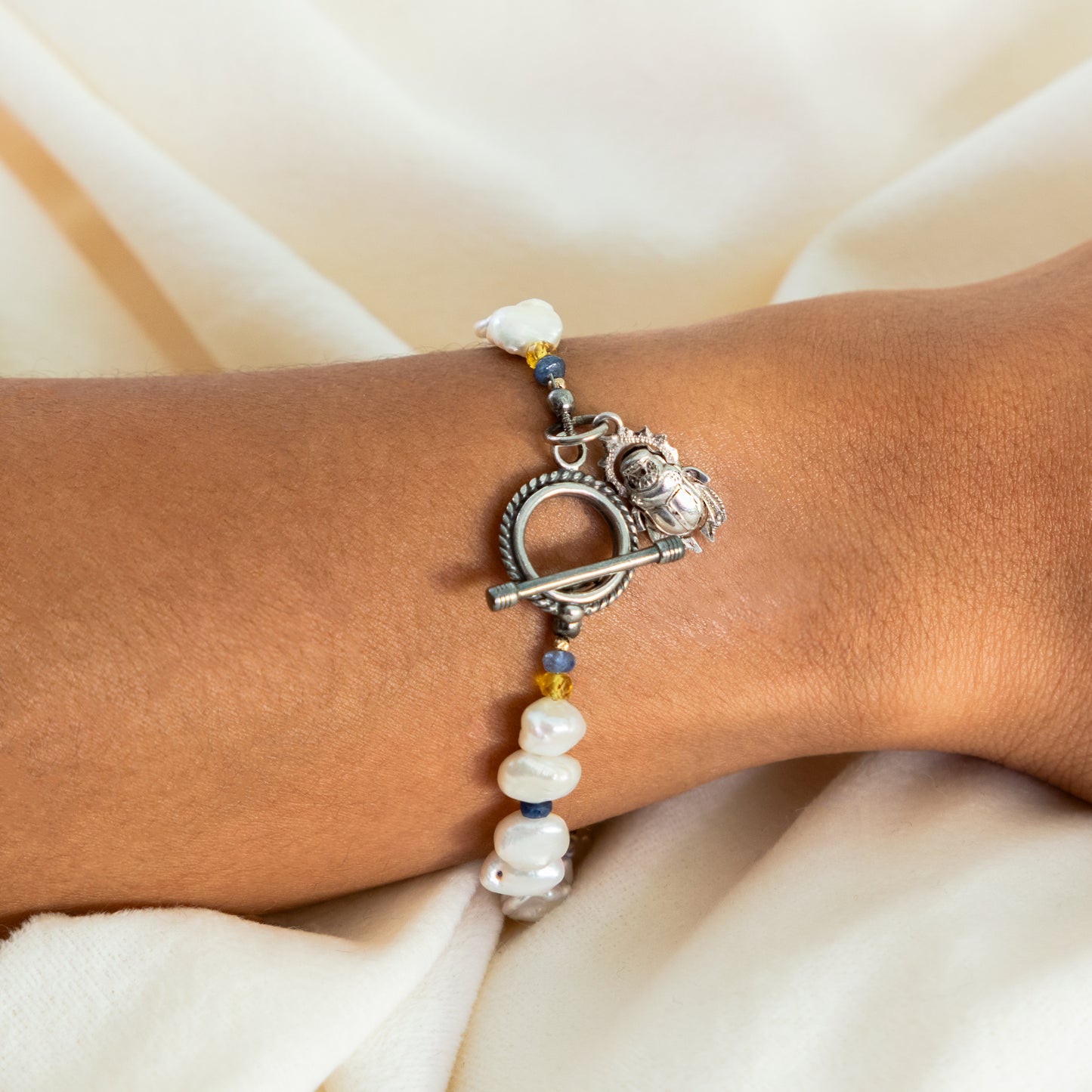 Terzah- Boho Keshi Pearl and Sapphire Bracelet with Detailed Scarab Beetle Charm.