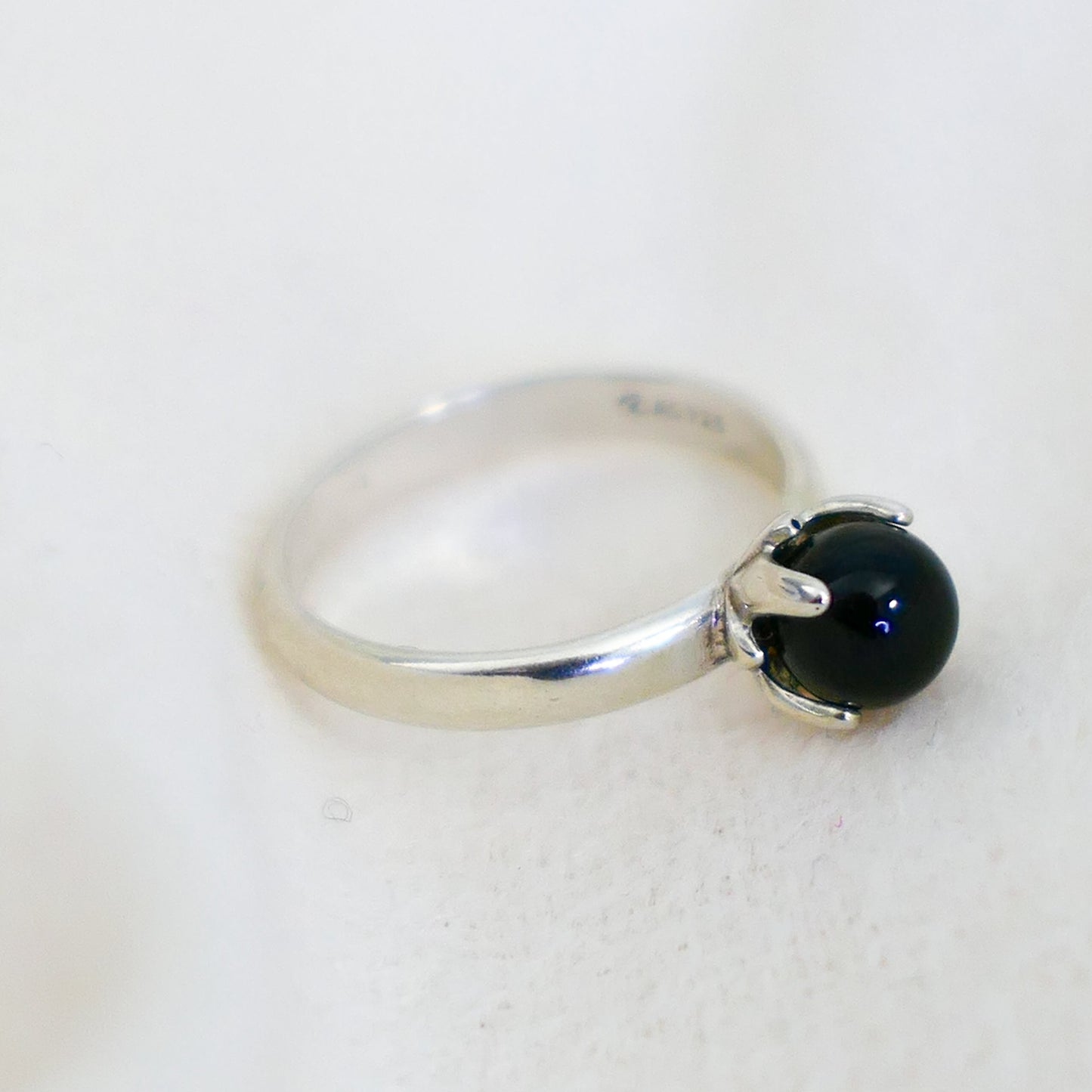 Asima - Black Onyx Ring Set in a Solid Easy Care Argentium® Silver Flower Setting