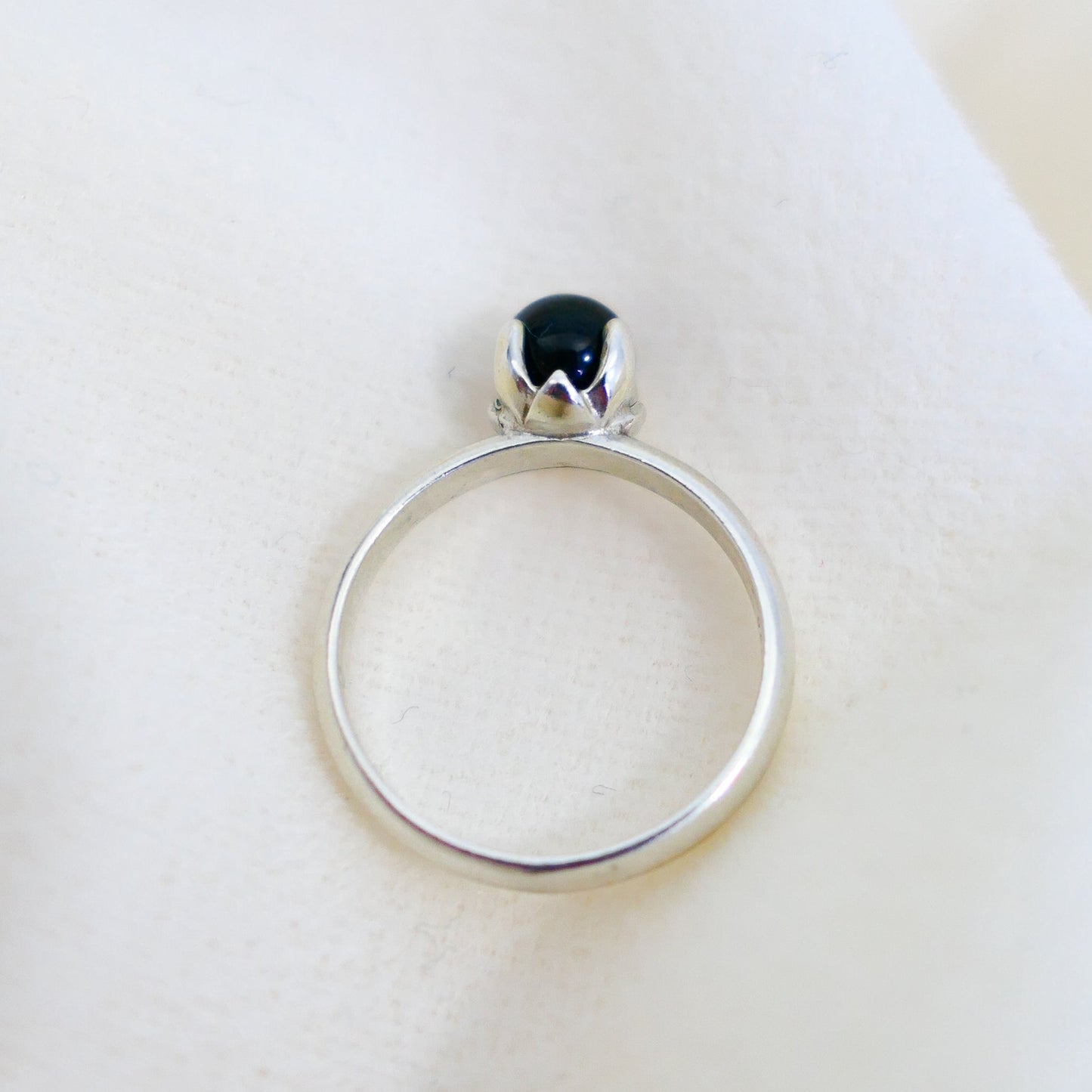 Asima - Black Onyx Ring Set in a Solid Easy Care Argentium® Silver Flower Setting