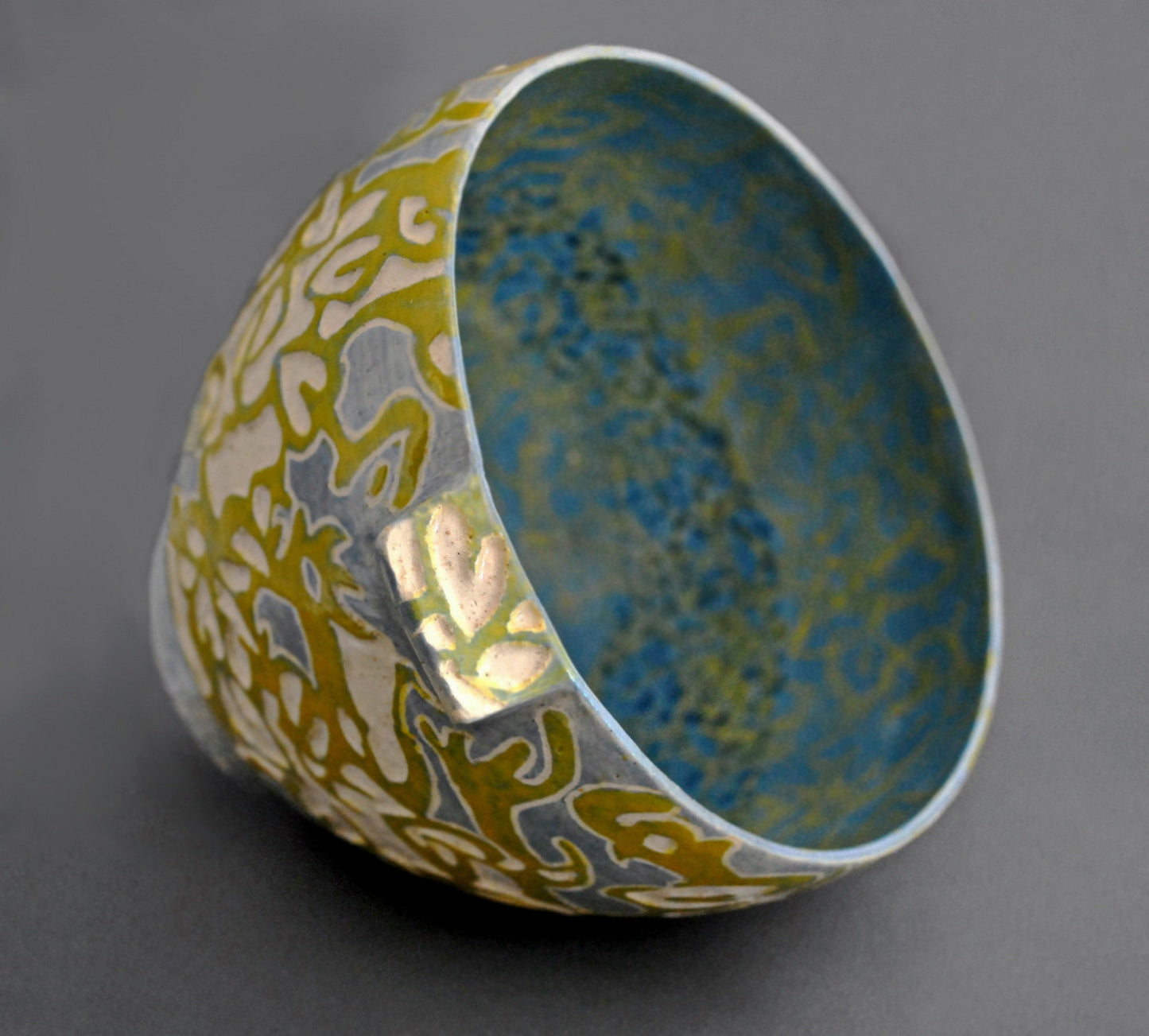 Shade Patterns - Ceramic Bowl hand carved with leaf patterns in blue and yellow.Food safe. FREE SHIPPING US.