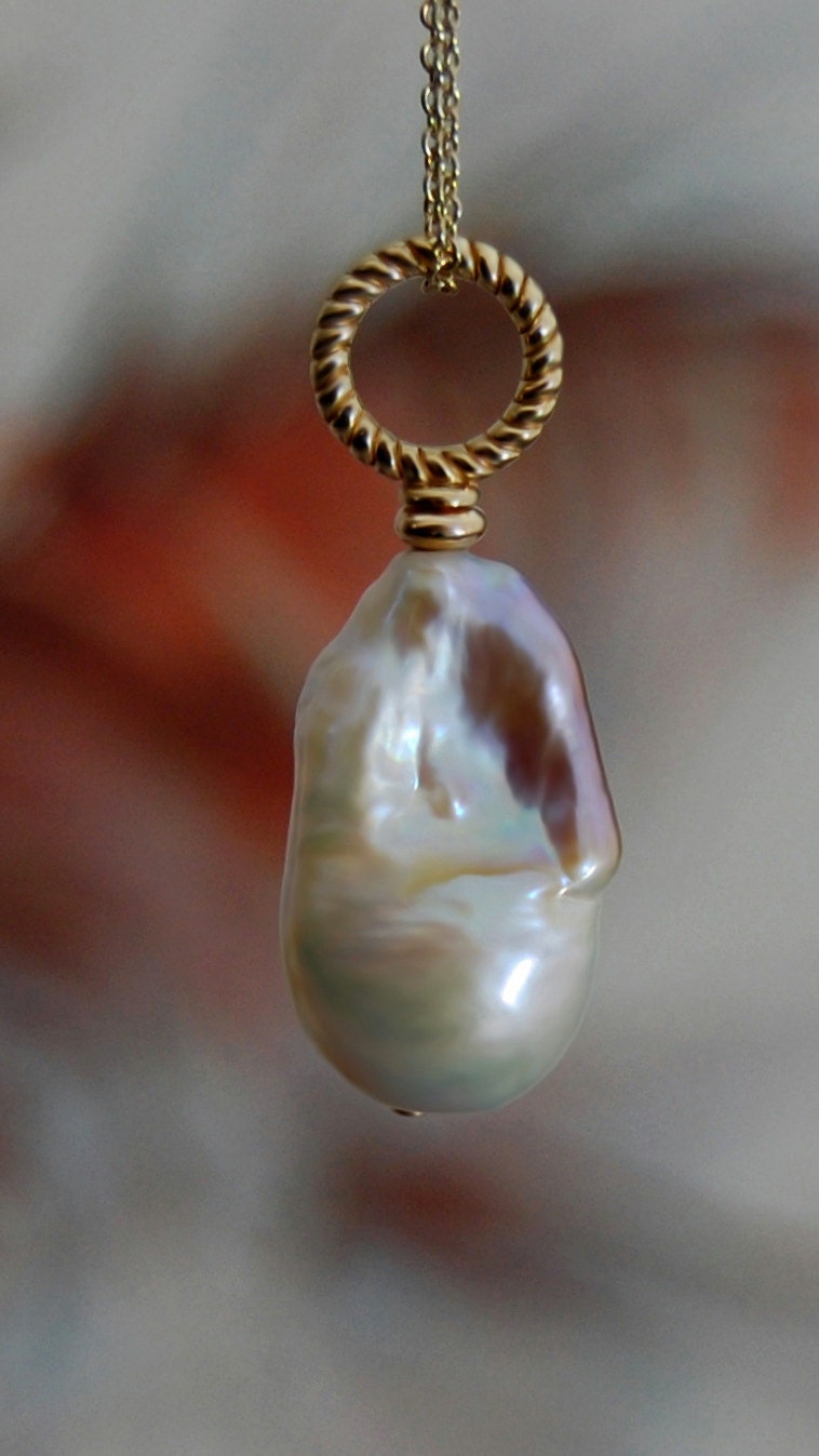 Lillia - Pearl Pendant Features a Unique Bi-Color Freshwater Pearl Set in 14kt Gold, Free Shipping within the US.