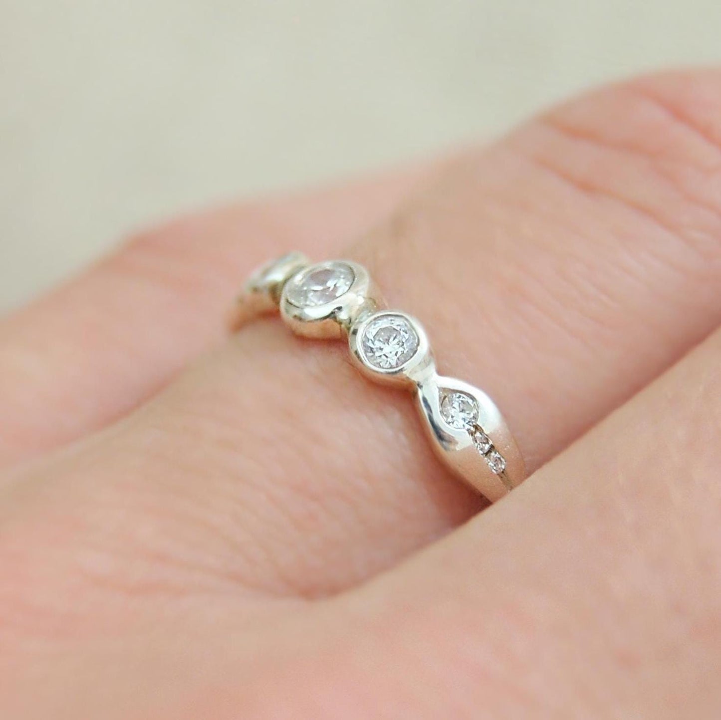 Nora - Delicately Beautiful Three Stone Engagement, Commitment or Stacking Ring with Accent CZ Side Gemstones, Set in Solid Silver.