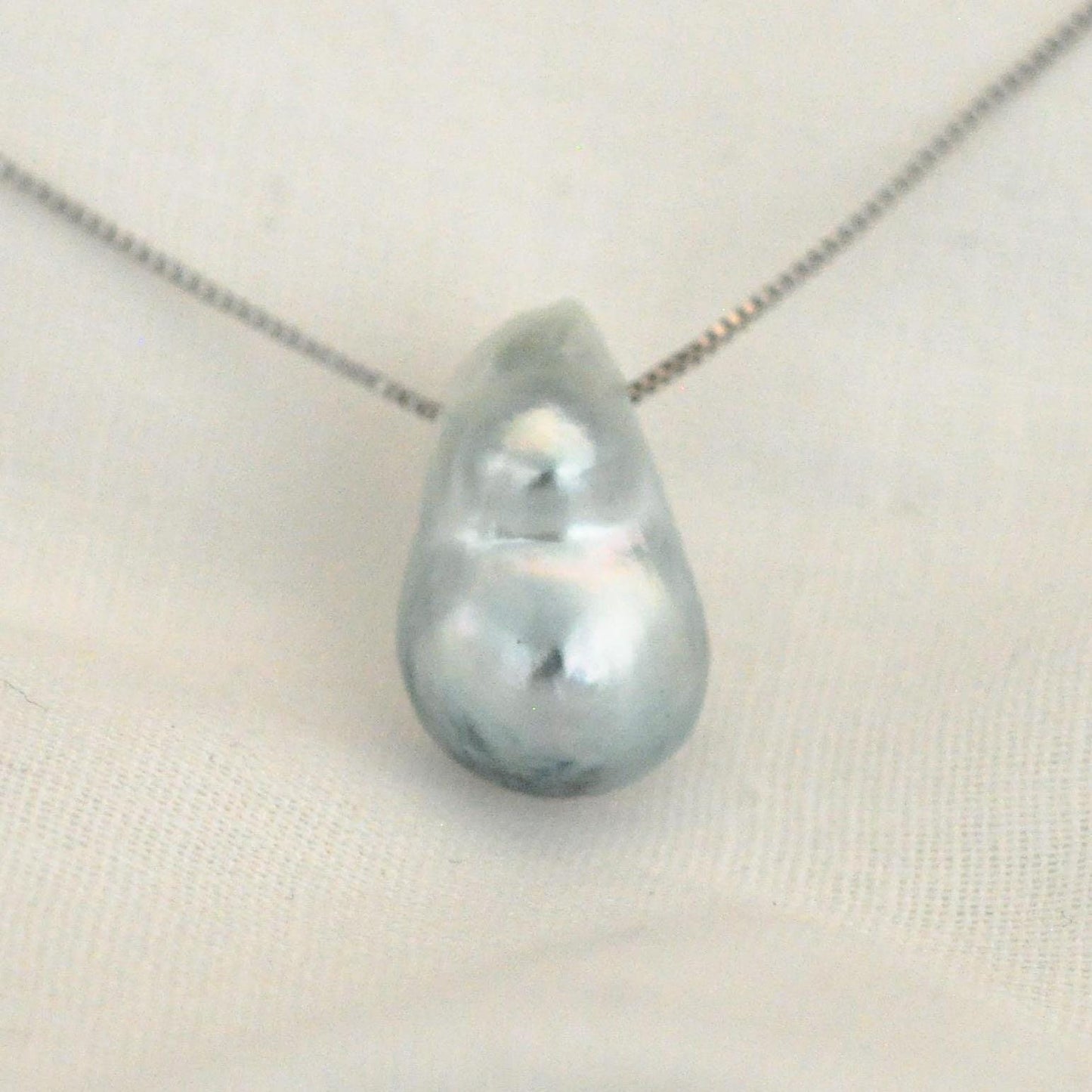 Tammy - Floating South Sea Pearl Pendant Necklace in Blue/Gray set on Solid Sterling Silver Rhodium Plated Chain for Ease of Care.
