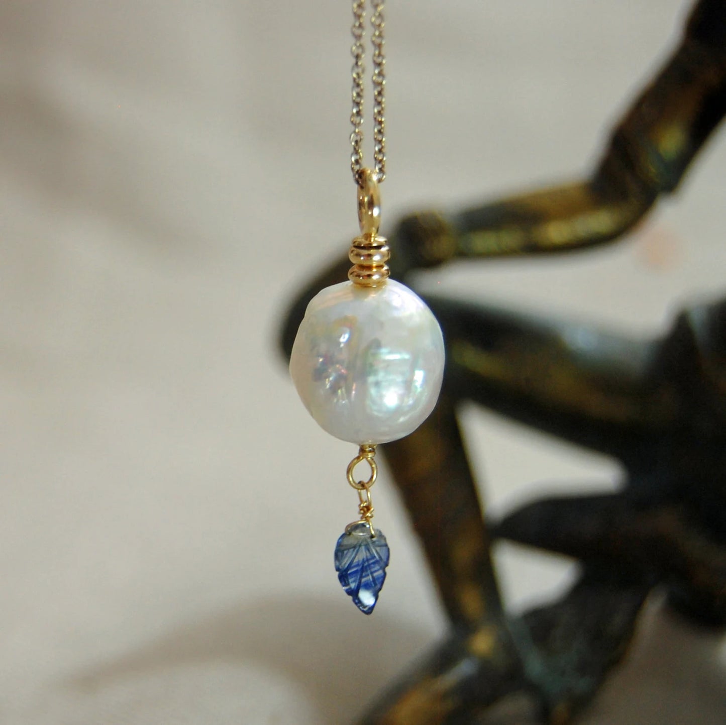 Aine - White Pearl Pendant with Blue Sapphire Dangle, set in solid 14kt gold.