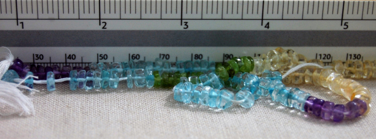D323 - Multi-Color, Semi-Precious Wheel Shaped Beads