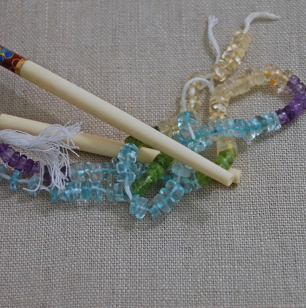 D323 - Multi-Color, Semi-Precious Wheel Shaped Beads