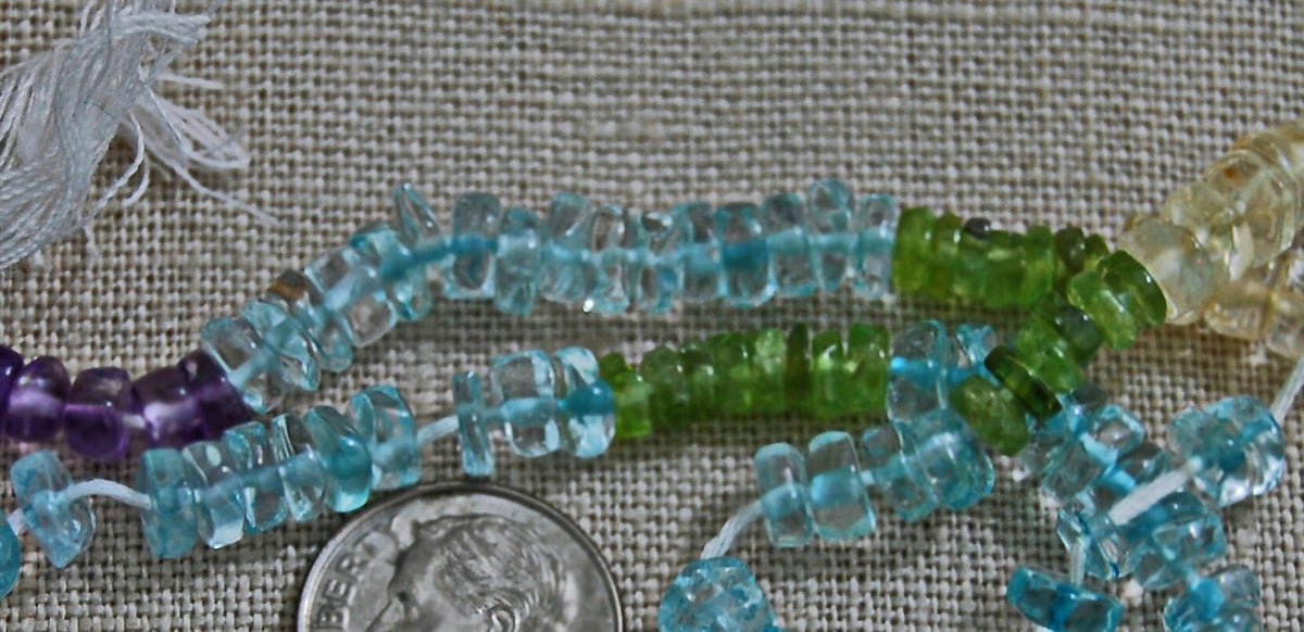 D323 - Multi-Color, Semi-Precious Wheel Shaped Beads