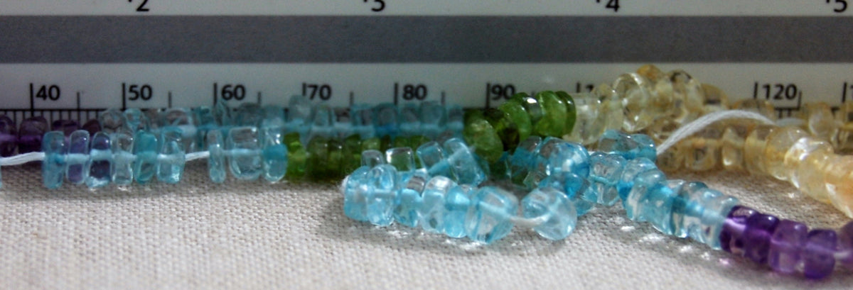 D323 - Multi-Color, Semi-Precious Wheel Shaped Beads