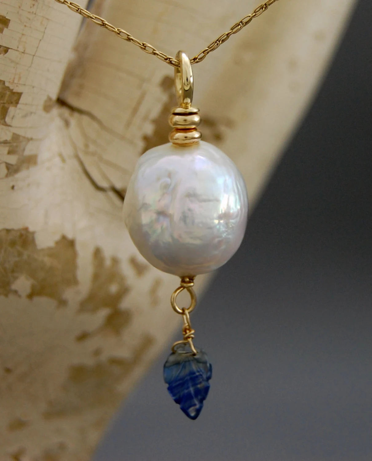 Aine - White Pearl Pendant with Blue Sapphire Dangle, set in solid 14kt gold.